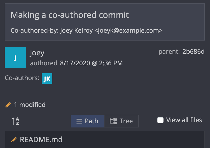 Commit details in GitKraken showing a co-authored commit with the primary author and a listed co-author under the commit message.